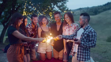 group-of-friends-having-fun-with-sparklers.-shot-in-slow-motion