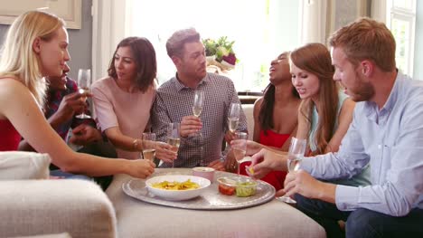 Group-Of-Friends-Celebrating-Together-At-Home-Shot-On-R3D