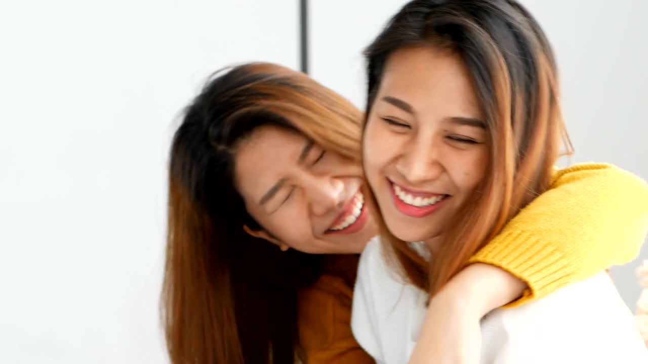 Young Asian Lesbian LGBT Couple Moments Happiness Concept. Free Stock Video  Footage Download Clips Family