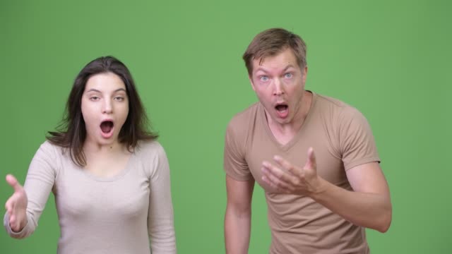 Shocked-young-couple-getting-bad-news-together