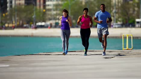 Multi-Ethnic-male-and-females-distance-training-outdoors