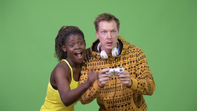 Young-multi-ethnic-couple-playing-games-together
