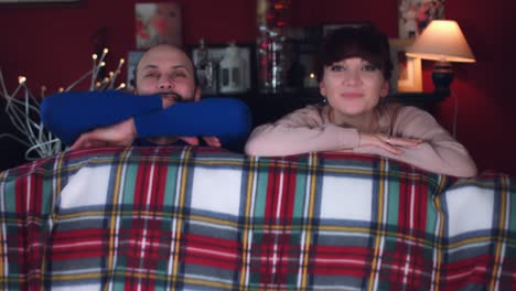 4k-Authentic-Shot-of-a-Couple-Playing-Peekaboo-on-Couch