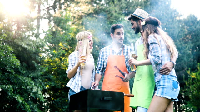 Friends-spending-time-in-nature-and-having-barbecue