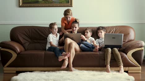 Mother-with-sons-spends-leisure-time-at-home