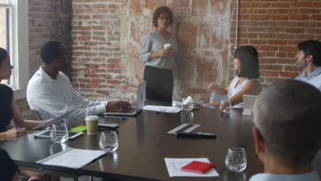 Group-Of-Businesspeople-Meeting-In-Boardroom-Shot-On-R3D