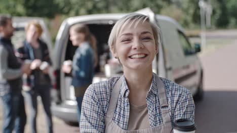 Laughing-Barista-in-Front-of-Mobile-Coffee-Van