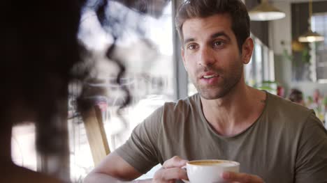 Couple-Meeting-For-Date-In-Coffee-Shop-Shot-In-Slow-Motion
