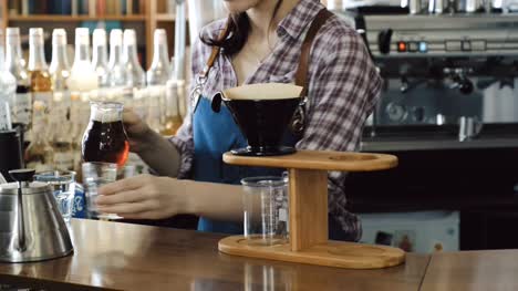 Barista-serving-coffee-pour-over