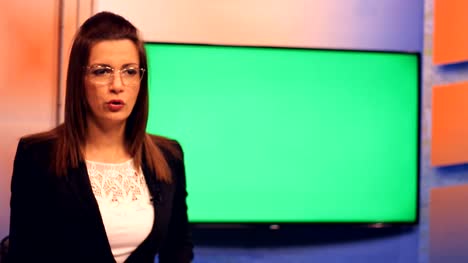 Young-woman-TV-presenter-,Green-Screen-background