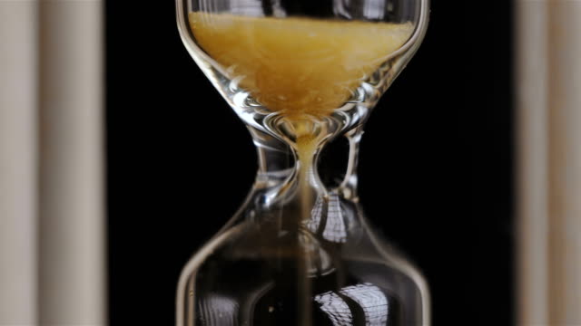 Close-up-of-sand-in-an-hourglass