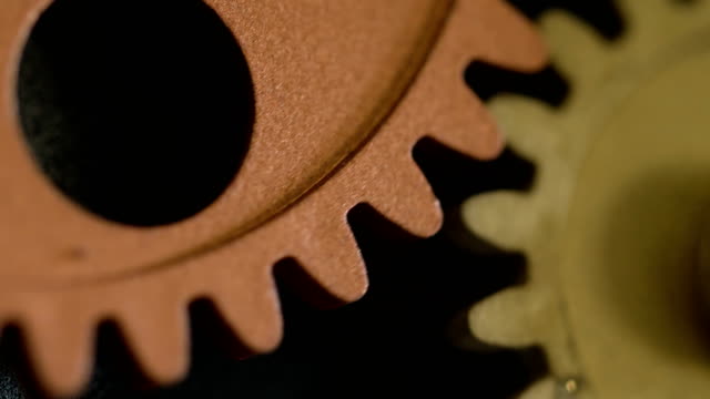 mechanism-wheels-turning-Progress,innovation,ideas--close-up