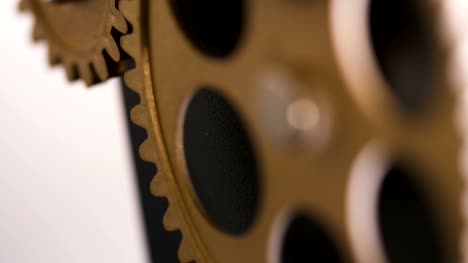 Clock's-wheels-marking-the-time-running,-close-up