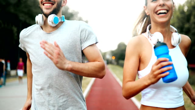 Beautiful-couple-jogging-and-fitness-training-outdoor