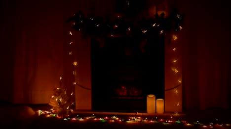 New-year-and-Christmas-celebration-near-fireplace-in-room