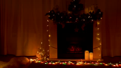 New-year-and-Christmas-celebration-near-fireplace-in-room