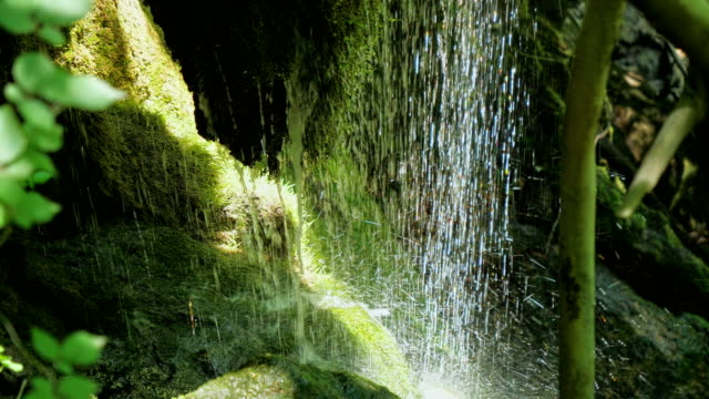 SLOW-motion,-waterfall,-stream-in-mountains-in-high-speed-frame-rate