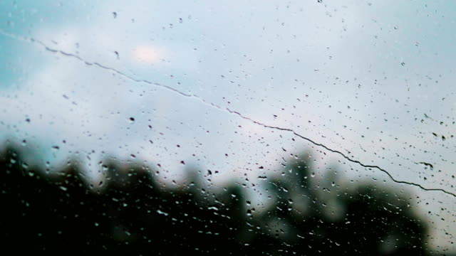 Driving-car-on-rainy-day-in-4k-slow-motion