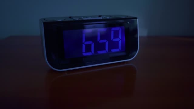 close-up-shot-of-alarm-clock-turns-7-AM