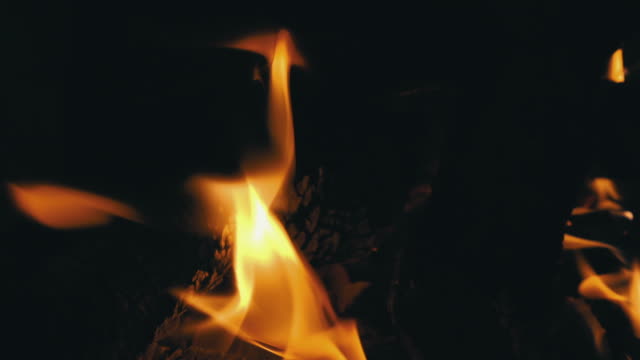 Closeup-of-Flames-Burning-on-Black-Background