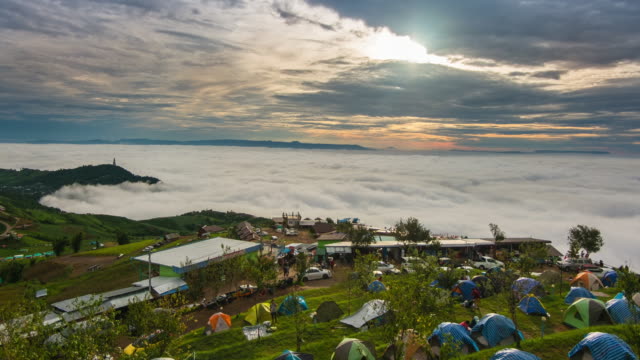 morning-on-top-hill-with-cloud-sea-fog-and-small-village