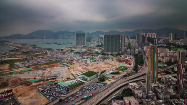 China-hong-kong-día-luz-superior-construcción-redonda-panorama-4k-lapso-de-tiempo