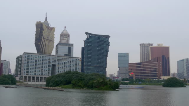 China-Macao-ciudad-crepuscular-tiempo-isla-bahía-famoso-hotel-4k