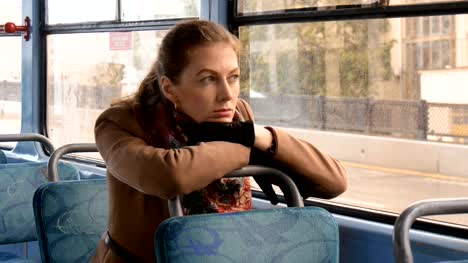 A-beautiful-girl-with-sad-eyes-is-alone-in-the-tram.