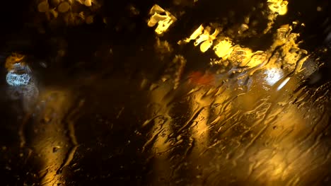 the-flow-of-water-on-the-windscreen-during-heavy-rain