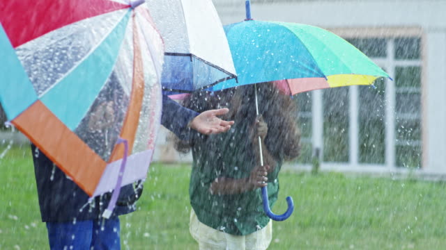 Children-Playing-in-Rain