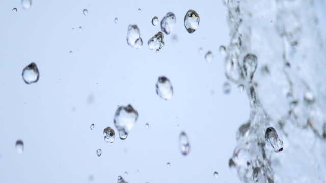 Slow-motion:-water-drop-fall-from-eaves-in-close-up