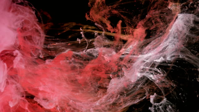 Red-And-White-Ink-Paints-Colors-in-Water-Creating-Shapes