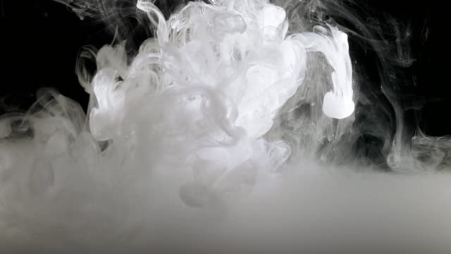 Concept-Art-White-Paint-In-Water-As-Smoke-In-Slowmotion
