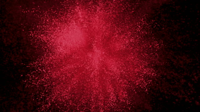 Rotes-Pulver-auf-schwarzem-Hintergrund-in-Superzeitlupe-explodieren