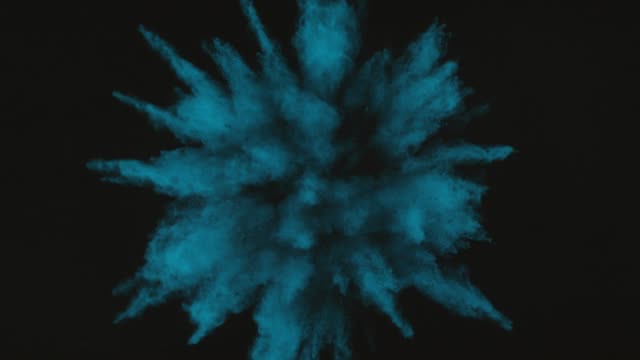 Blue-Green-powder-exploding-on-black-background-in-super-slow-motion