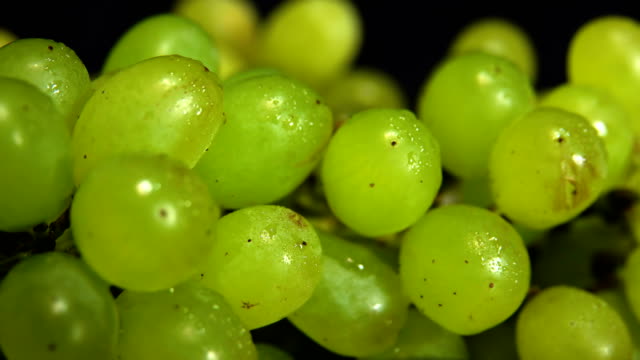 Berries-of-green-grapes-in-drops-of-water