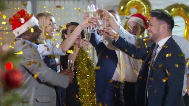 Businesspeople-Clinking-Glasses-at-New-Years-Party