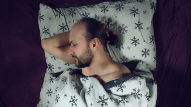 4k-Authentic-Shot-of-a-Man-in-Bed-Sleeping