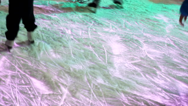 Concept-Ice-and-Skate,-Winter-Healthy-Lifstyle.-Many-Skates-Pass-by-Close-up.