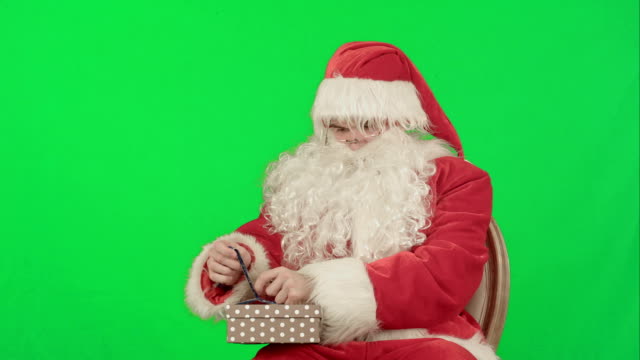 Weihnachtsmann:-Fröhliche-Geschenke-auf-einem-grünen-Bildschirm-Chrome-Schlüssel