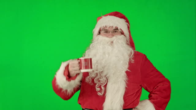 Santa-drinks-from-a-red-cup-on-a-Green-Screen-Chrome-Key