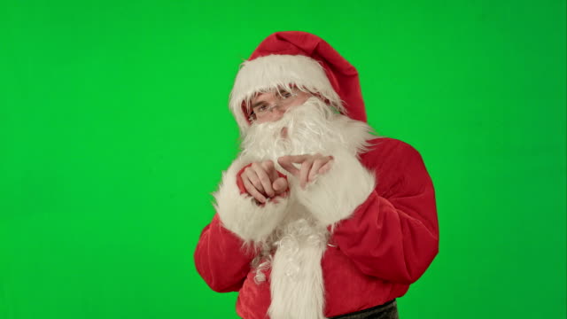 Weihnachtsmann-tanzt-in-Kostüm-auf-einem-Green-Screen-Chrome-Key