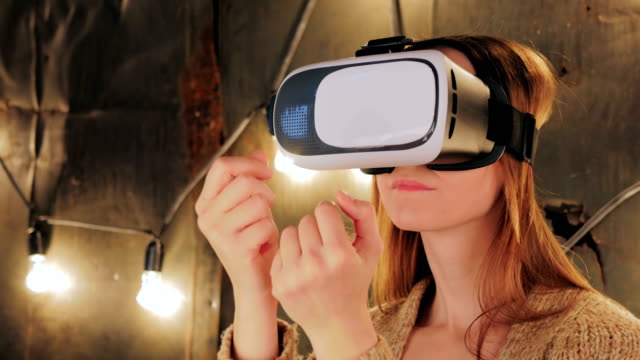 Young-woman-using-Virtual-Reality-Glasses