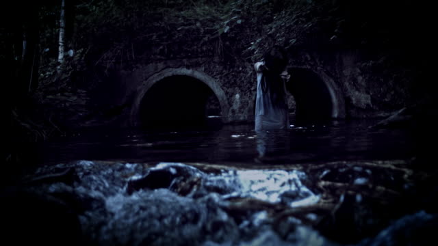 4K-Horror-Woman-Acting-Evil-in-River