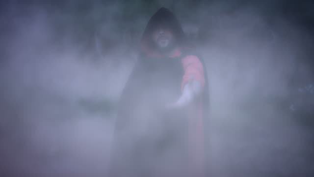 4K-Halloween-Horror-Man-with-Black-Cape-in-Smoke
