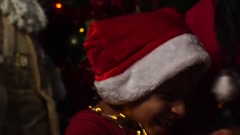 Brothers-playing-with-Christmas-lights