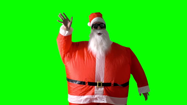 Santa-Claus-on-a-green-background-waves-in-front-view.