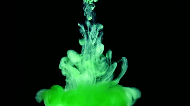Green-Ink-Colors-in-Water-Creating-Liquid-Art-Shapes