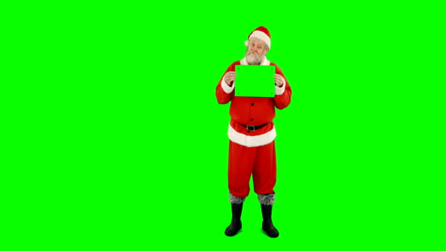 Santa-claus-holding-blank-board