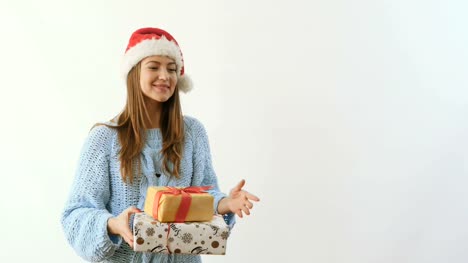 Happy-young-girl-with-presents-at-white-background